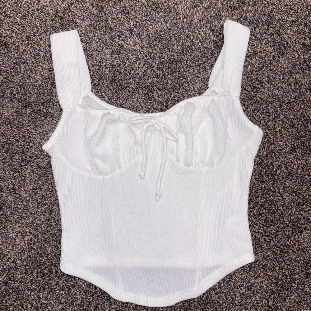 Lush white ribbed crop top with tie front detail, size S